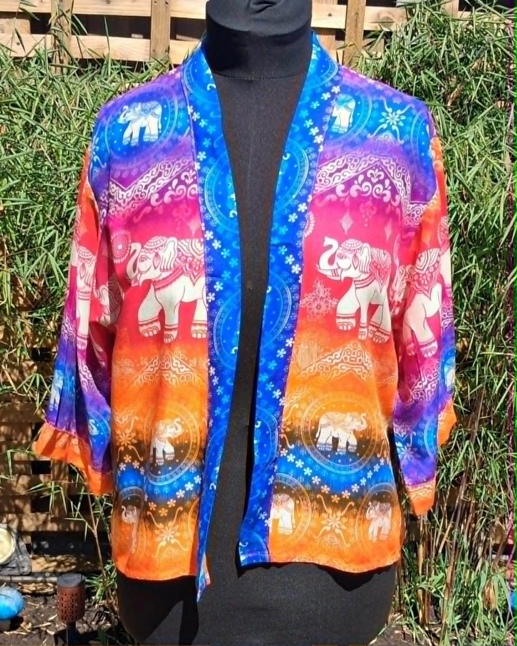 Rainbow elephant shrug blue